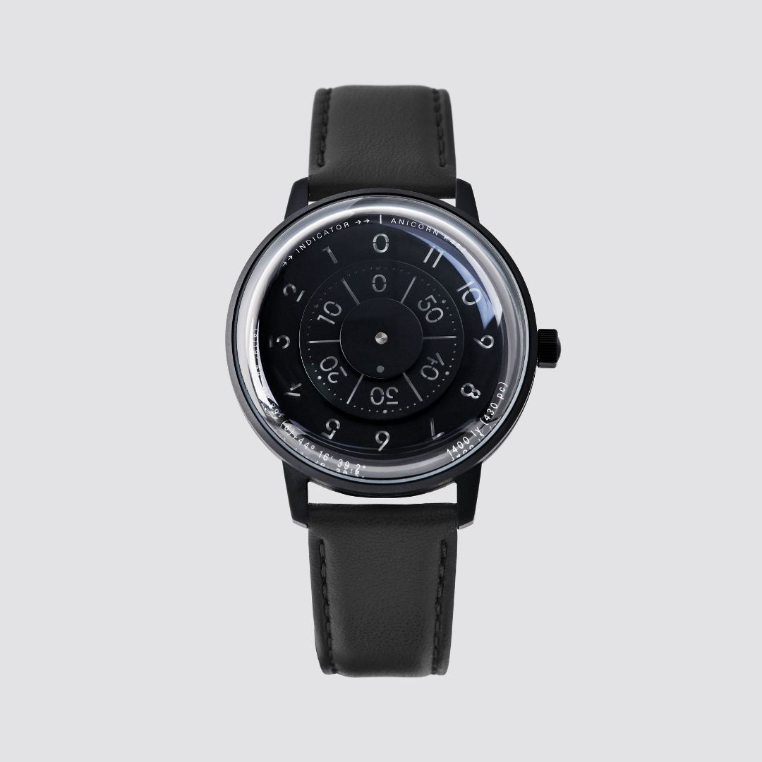 Anicorn K452 Nemesis black watch with a rotating disc dial and black leather strap.