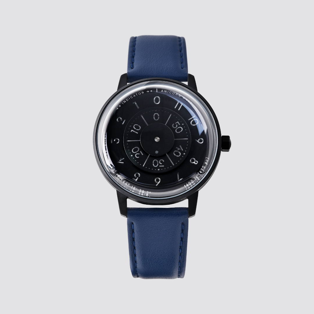 Anicorn K452 Nemesis black watch with a rotating disc dial and blue leather strap.
