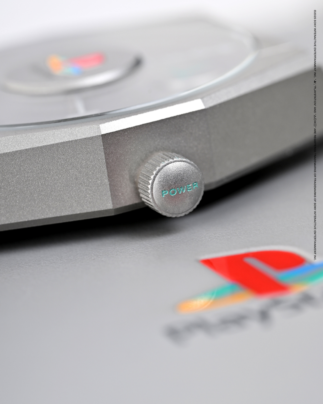 The crown of the timepiece ingeniously features the power button icon with the word "Power" engraved, a subtle nod to the excitement of turning on a PlayStation console and immersing oneself in a world of limitless possibilities.