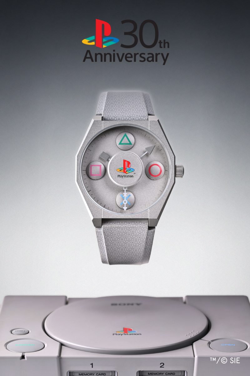 Anicorn x PlayStation 30th Anniversary watch featuring the classic PlayStation symbols, shown above the original PlayStation console.