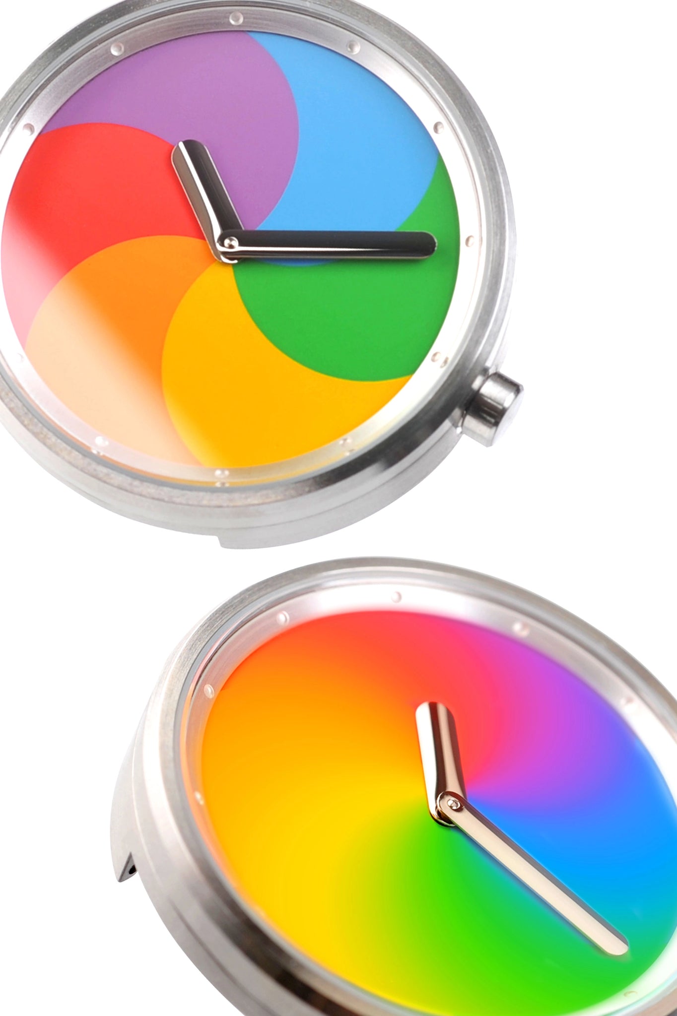 A close-up of two "Spinning Beach Ball" watches: one is static, and the other one is spinning.
