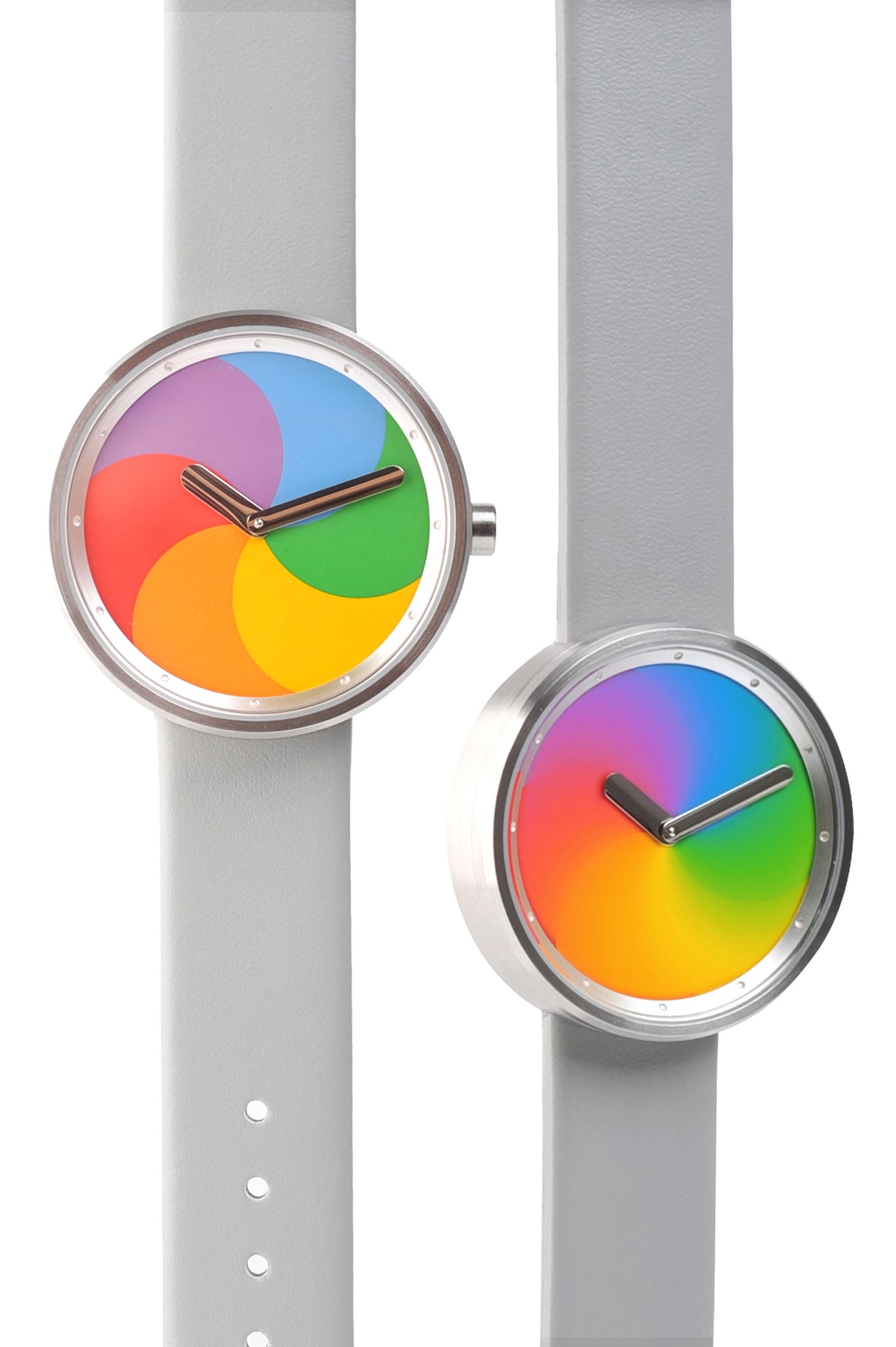 A close-up of two "Spinning Beach Ball" watches with strap: one is static, and the other one is spinning.
