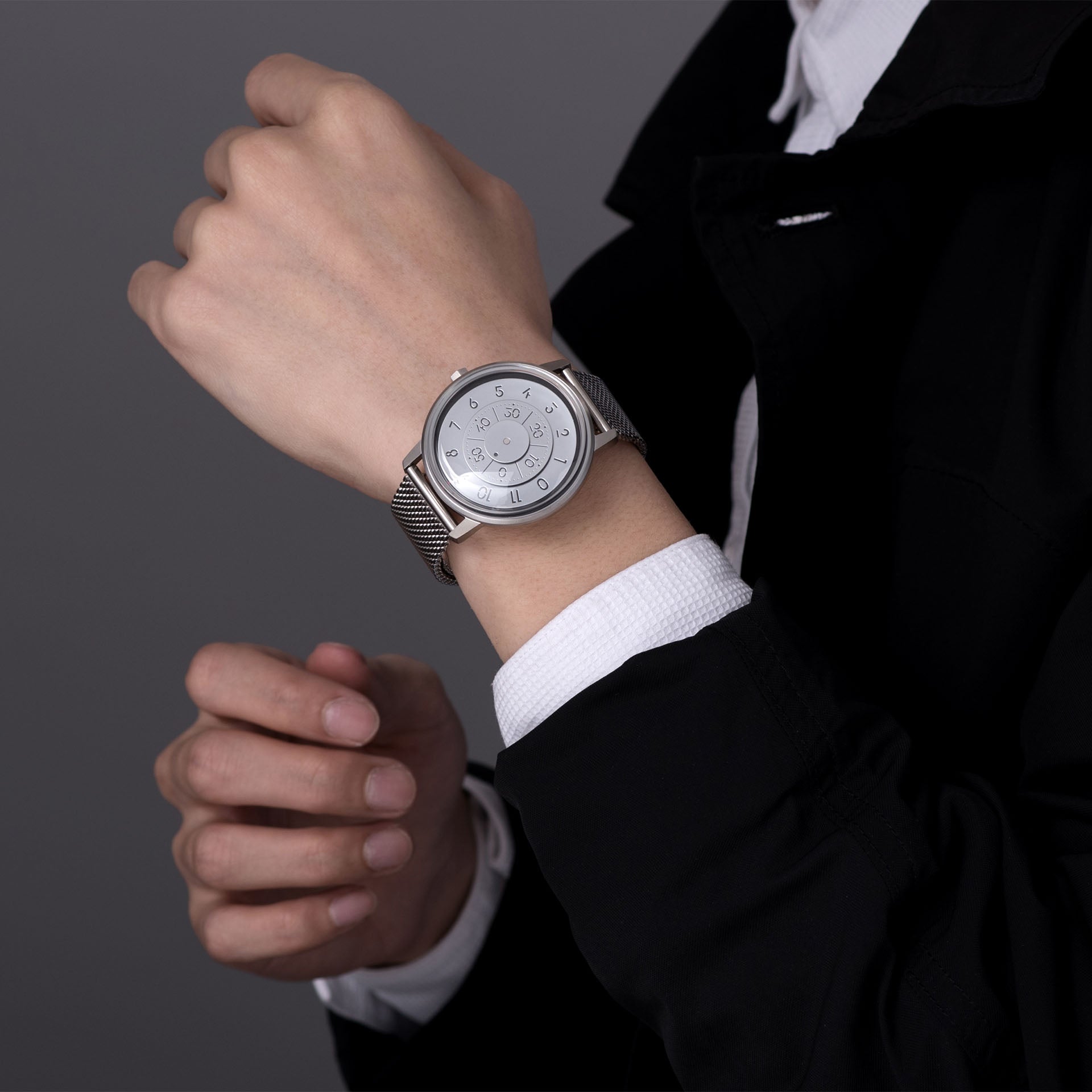 Someone wearing an ANICORN Series K452 Space Automatic Watches - Luna 