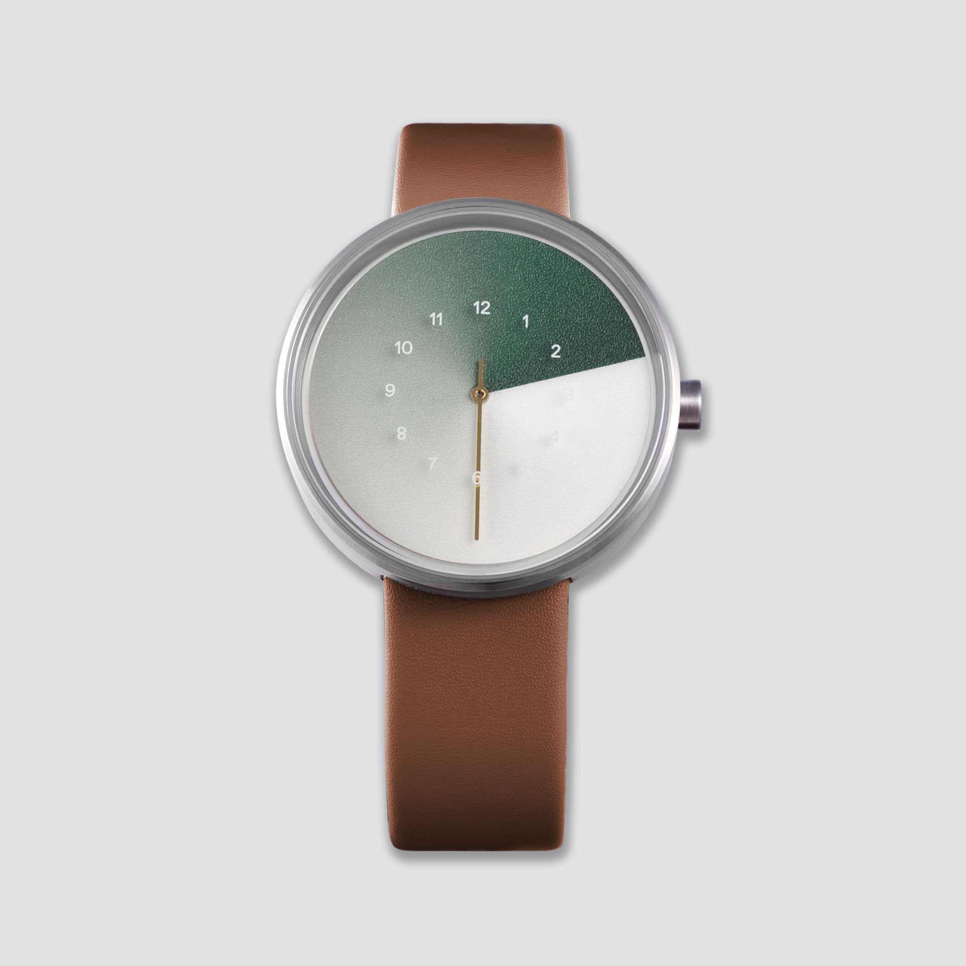 TTT#1 - Seoul - Hidden Time Watch - Olive. The front-view of the timepiece features a sleek green watch face, set against a background of rich brown straps, creating a unique and stylish look that is sure to turn heads. 