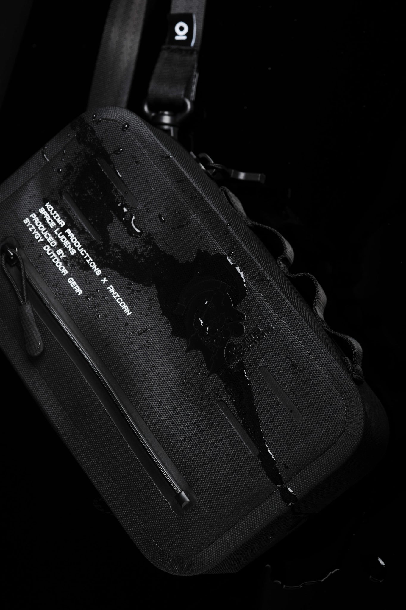 Ludens Sacoche has KOJIMA PRODUCTIONS logo subtly printed on the front; it is made with TPU material, which is lightweight, waterproof, durable and non-toxic.