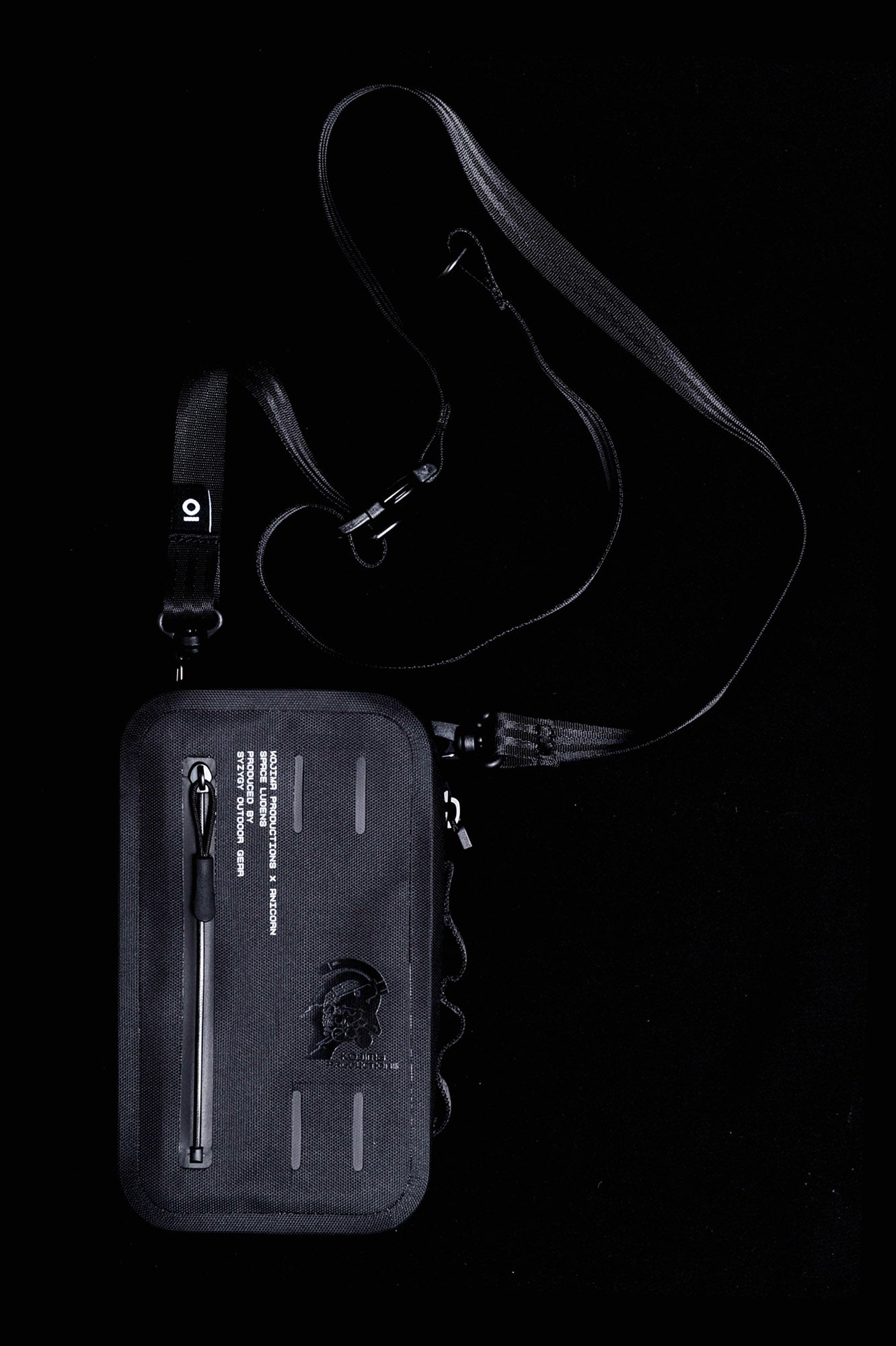 Ludens Sacoche has KOJIMA PRODUCTIONS logo subtly printed on the front; it is made with TPU material, which is lightweight, waterproof, durable and non-toxic.