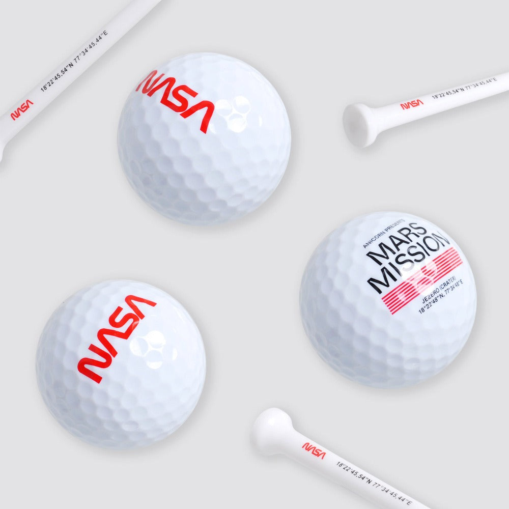 The Mars Swing golf set comes in three balls featuring NASA’s worm logo and three tees printed with coordinates of Jezero Crater in a premium metal case.