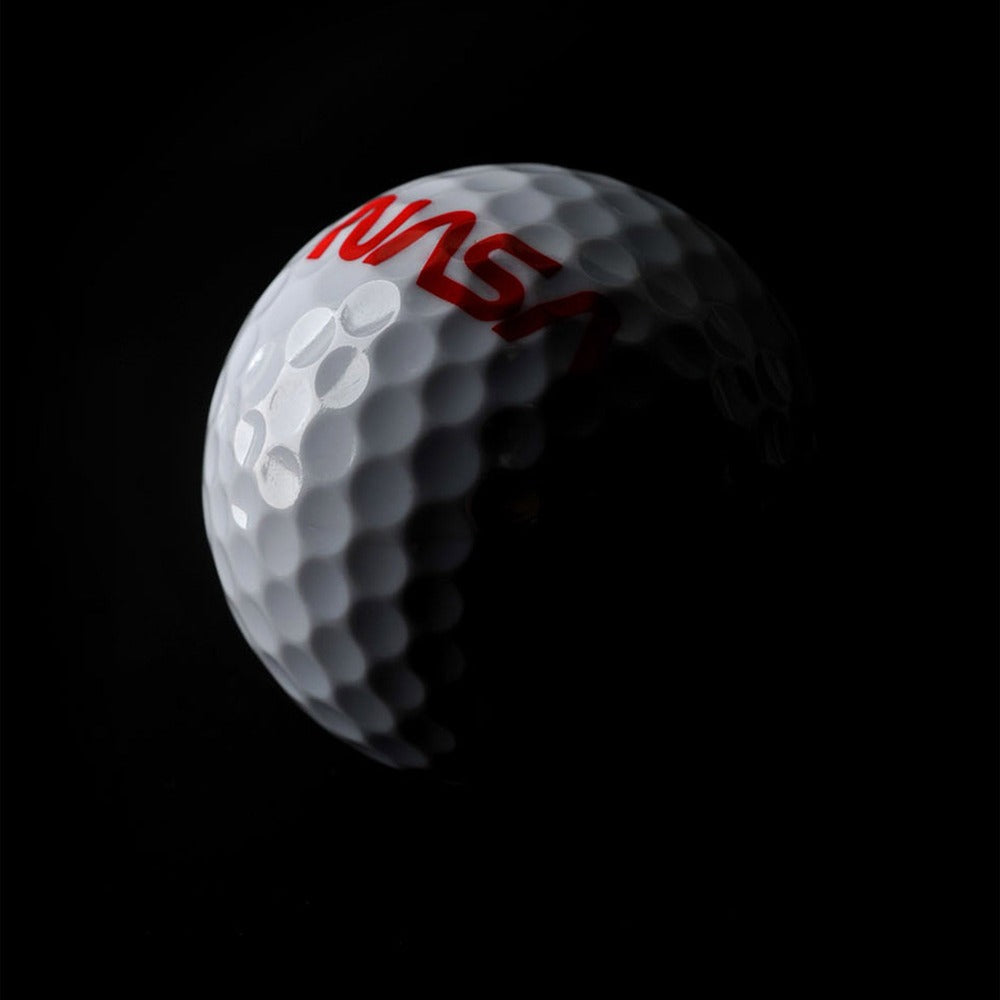 The Mars Swing golf set comes in three balls featuring NASA’s worm logo and three tees printed with coordinates of Jezero Crater in a premium metal case.