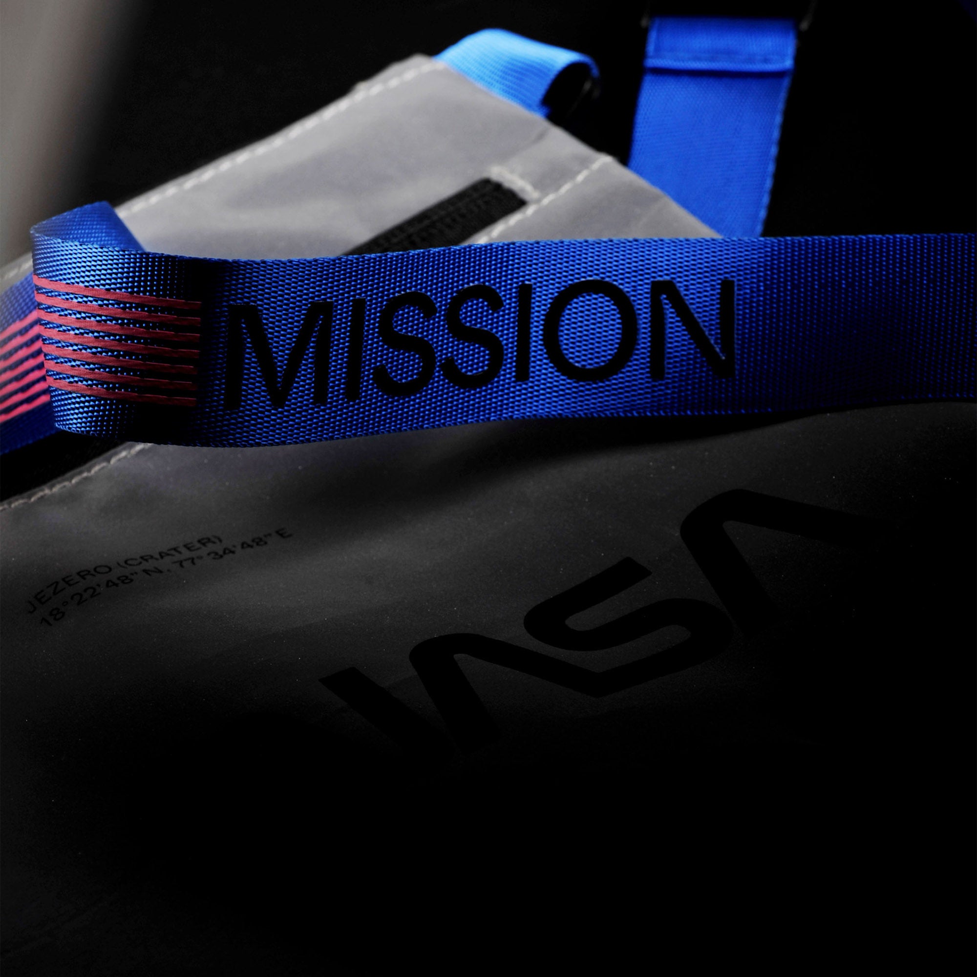 NASA astronautical wear inspired messenger bag made with reflective and waterproof textile. A collaboration with Elephat Urban Equipment.