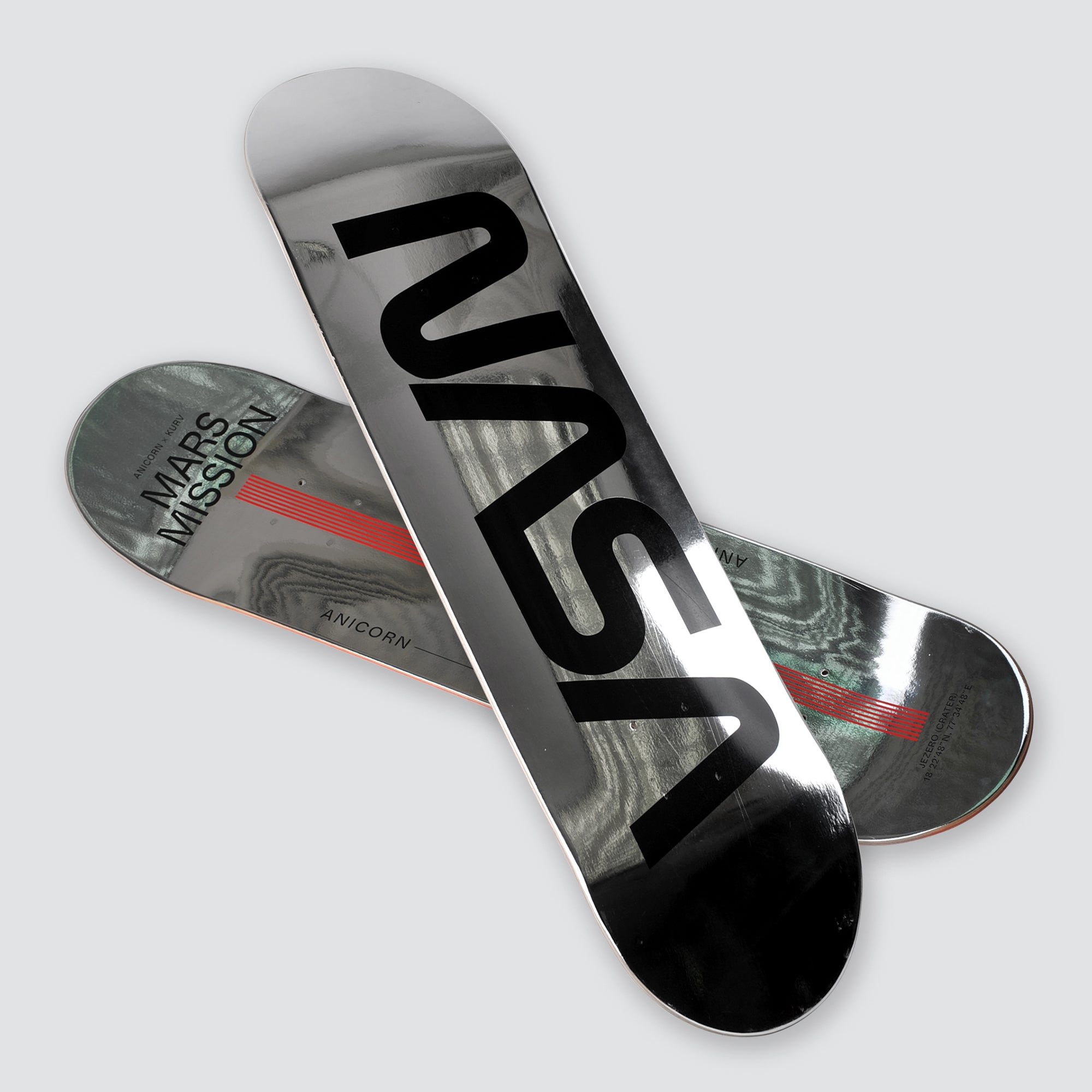 Silvery coated skateboard deck for Mars hovering. The full size (80 x 20 cm / 31 x 8 in) Mars Edge skateboard is made of 7-PLY Grade A Canadian maple wood, it gives durability and flexibility for your hovering mission. The black on silver NASA logo also turns the skateboard into a splendid art piece on the wall. A collaboration with Kurv.